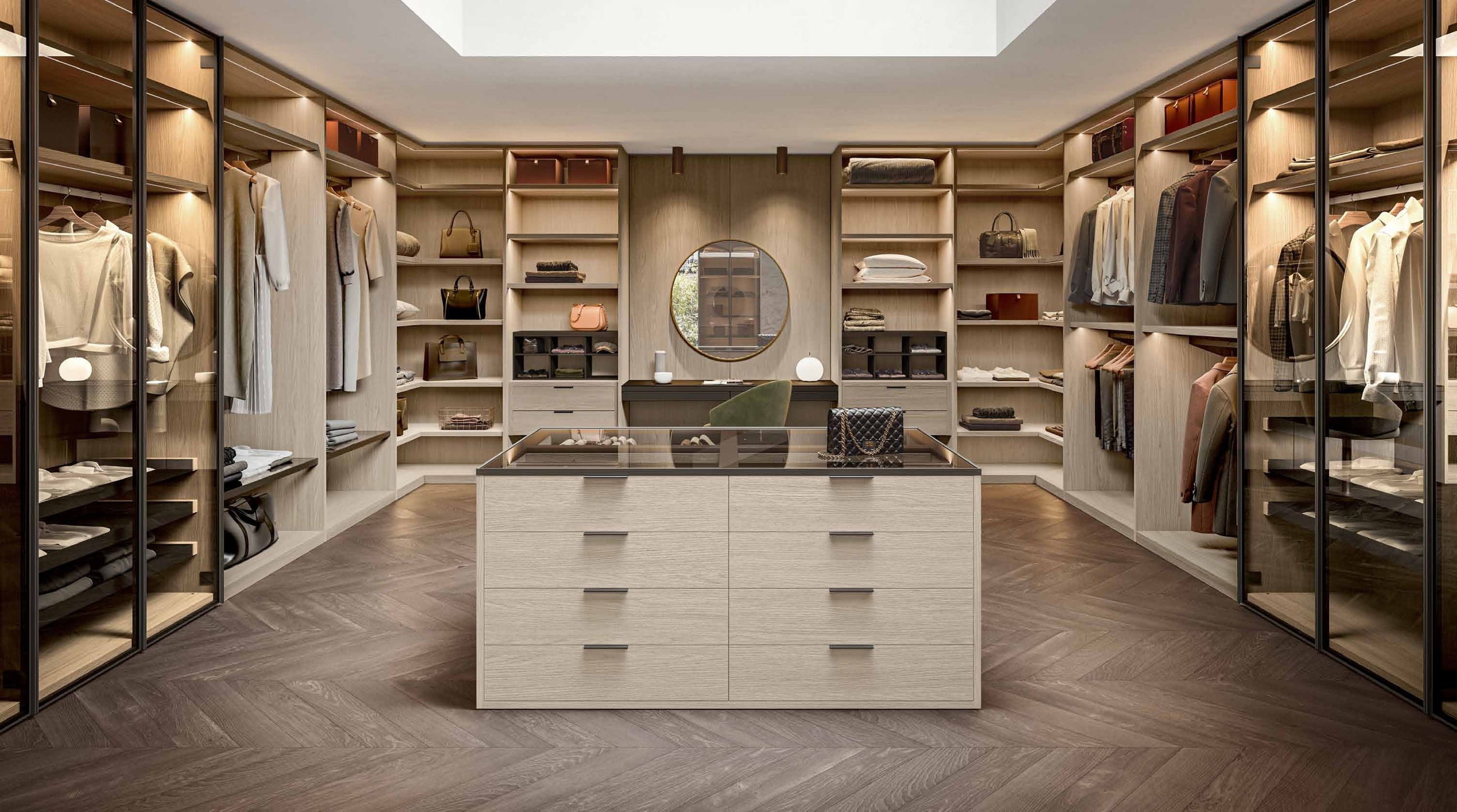 Composit walk-in wardrobe with illuminated storage and a central island